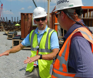 Two workers talking