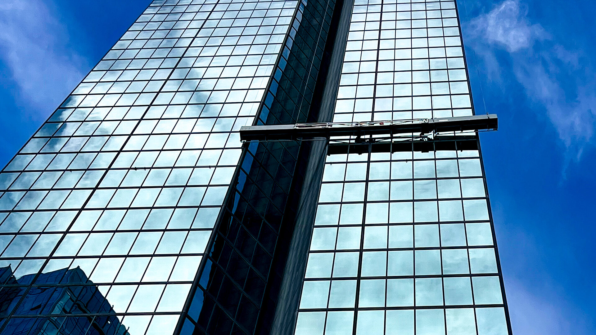 A worker working from a raised lift